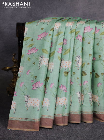 Pure tussar silk saree mild teal green with allover pichwai prints and woven border