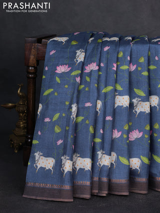 Pure tussar silk saree blue with allover pichwai prints and woven border