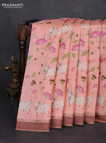 Pure tussar silk saree peach orange with allover pichwai prints and woven border