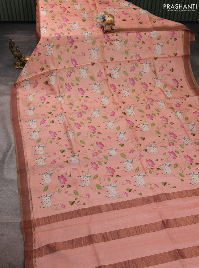 Pure tussar silk saree peach orange with allover pichwai prints and woven border