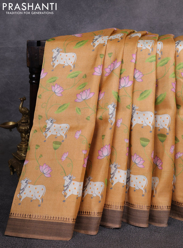 Pure tussar silk saree mustard yellow with allover pichwai prints and woven border
