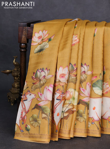 Pure tussar silk saree mustard yellow with pichwai prints and zari woven border
