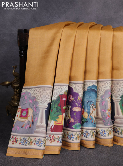 Pure tussar silk saree mustard yellow with plain body and long pichwai printed zari border