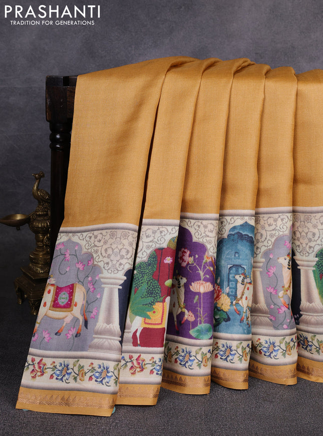 Pure tussar silk saree mustard yellow with plain body and long pichwai printed zari border