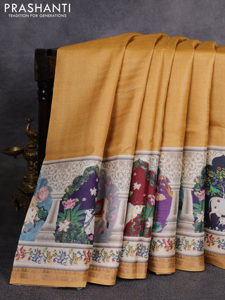 Pure tussar silk saree yellow with plain body and long pichwai printed zari border
