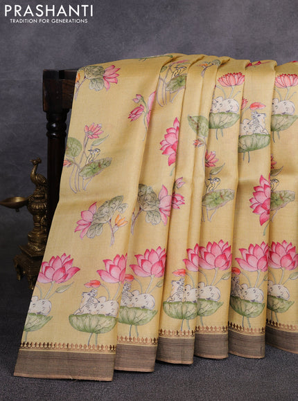 Pure tussar silk saree yellow shade with allover pichwai prints and woven border