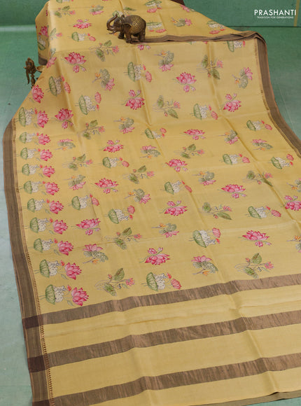 Pure tussar silk saree yellow shade with allover pichwai prints and woven border