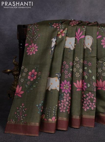 Pure tussar silk saree sap green with allover pichwai prints and woven border