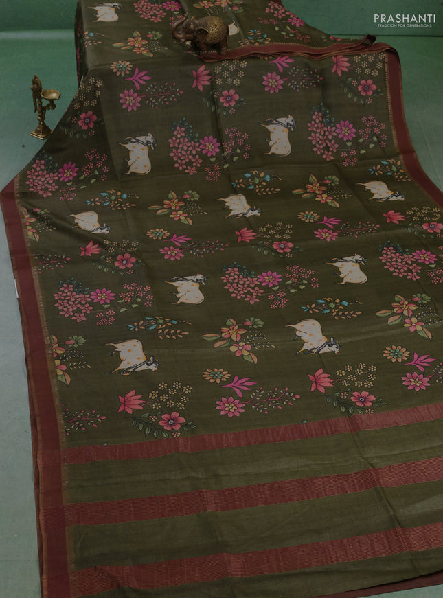 Pure tussar silk saree sap green with allover pichwai prints and woven border