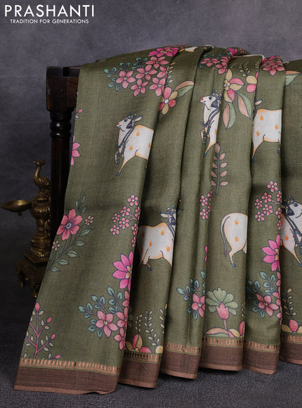 Pure tussar silk saree sap green with allover pichwai prints and woven border