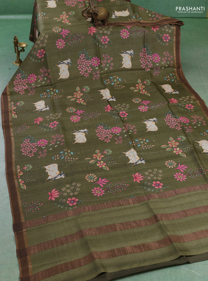 Pure tussar silk saree sap green with allover pichwai prints and woven border