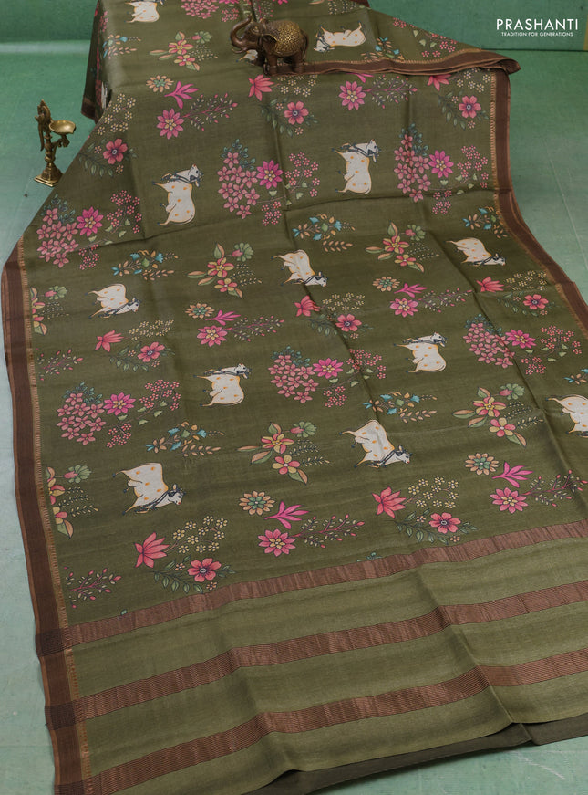Pure tussar silk saree sap green with allover pichwai prints and woven border