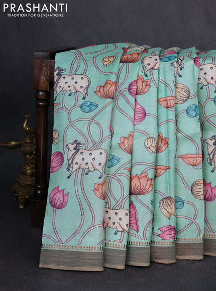 Pure tussar silk saree teal blue with allover pichwai prints and woven border