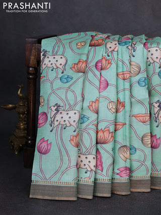 Pure tussar silk saree teal blue with allover pichwai prints and woven border