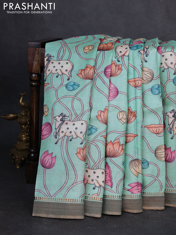Pure tussar silk saree teal blue with allover pichwai prints and woven border