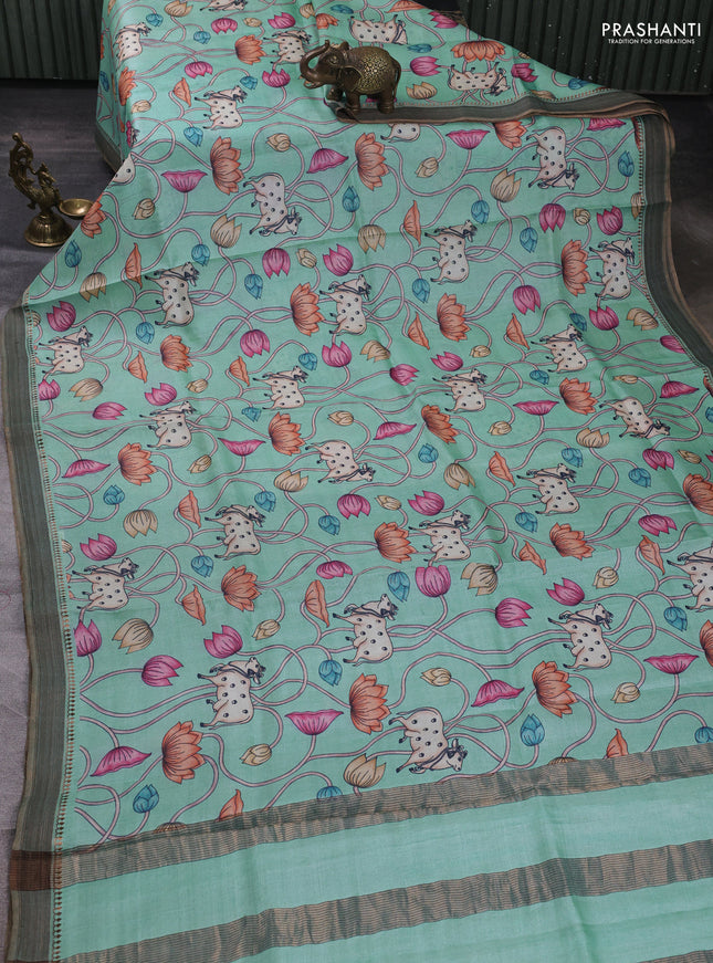 Pure tussar silk saree teal blue with allover pichwai prints and woven border