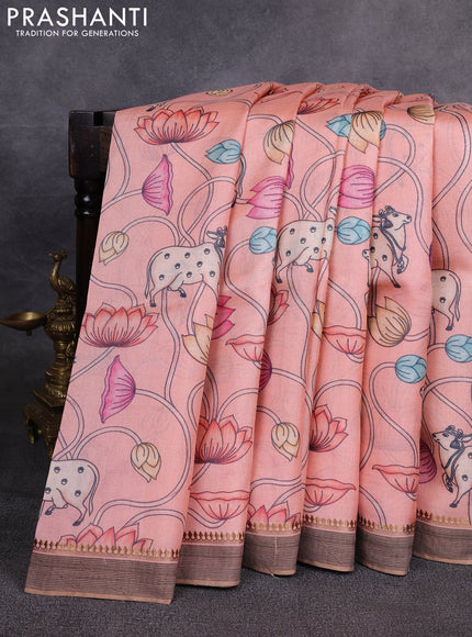 Pure tussar silk saree peach orange with allover pichwai prints and woven border