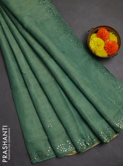 Art linen saree green with embroidery mirror work buttas and convent embroidery pallu