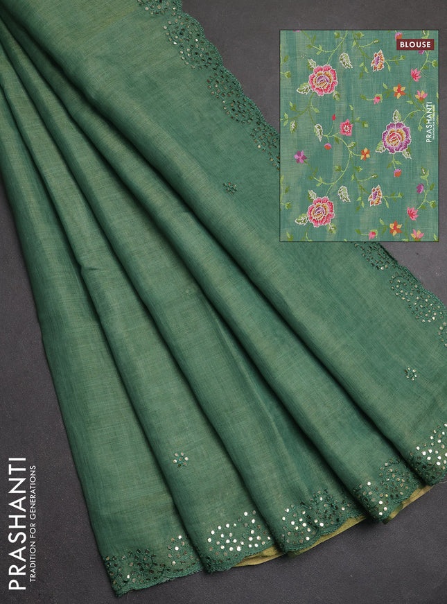Art linen saree green with embroidery mirror work buttas and convent embroidery pallu