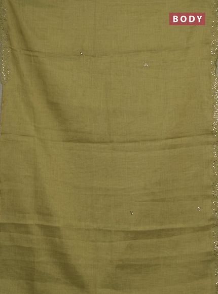 Art linen saree light green with embroidery mirror work buttas and convent embroidery pallu