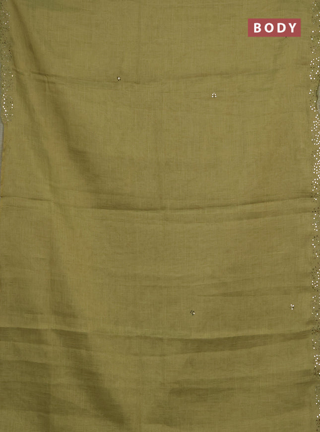 Art linen saree light green with embroidery mirror work buttas and convent embroidery pallu