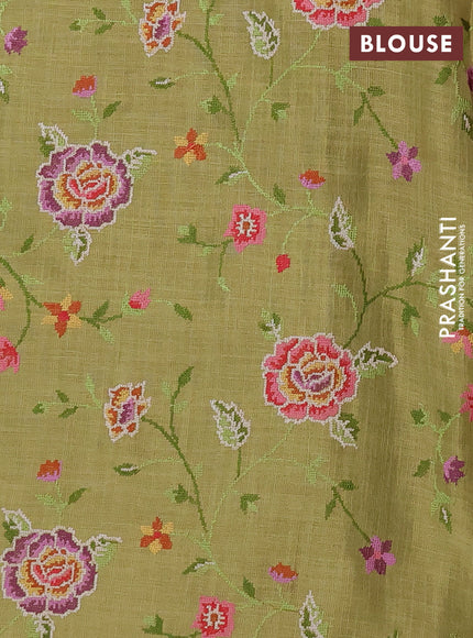Art linen saree light green with embroidery mirror work buttas and convent embroidery pallu