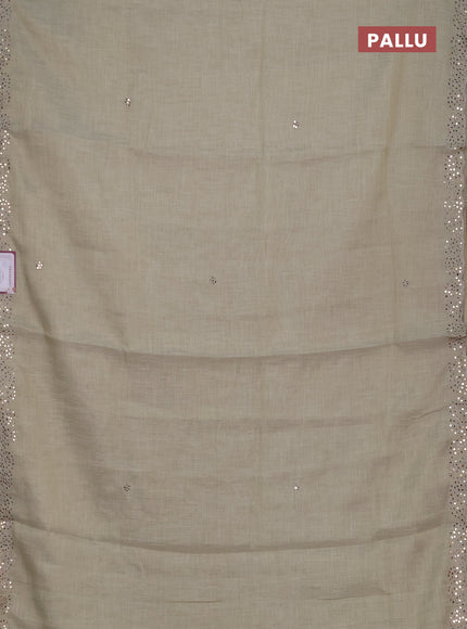 Art linen saree beige with embroidery mirror work buttas and convent embroidery pallu