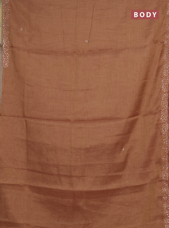 Art linen saree rust shade with embroidery mirror work buttas and convent embroidery pallu
