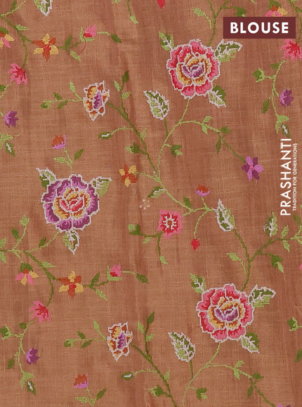 Art linen saree rust shade with embroidery mirror work buttas and convent embroidery pallu