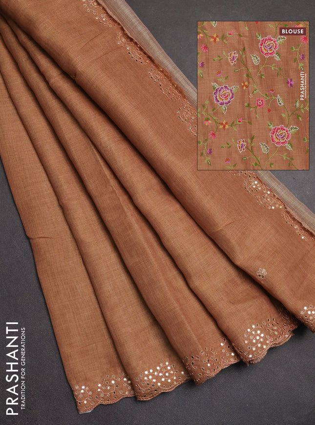 Art linen saree rust shade with embroidery mirror work buttas and convent embroidery pallu