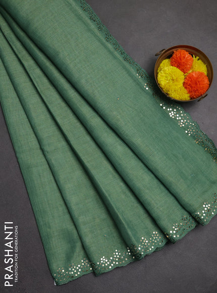 Art linen saree green with embroidery mirror work buttas and convent embroidery pallu