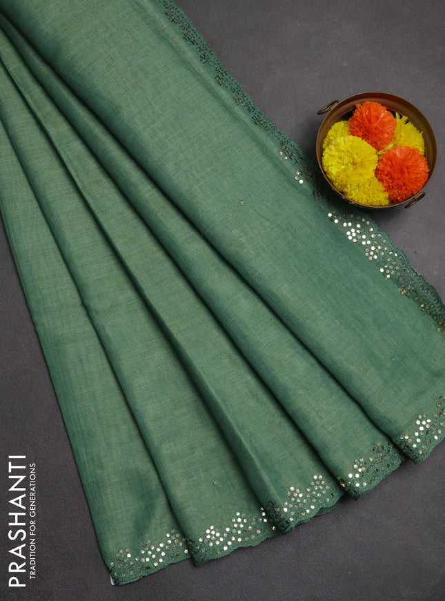 Art linen saree green with embroidery mirror work buttas and convent embroidery pallu