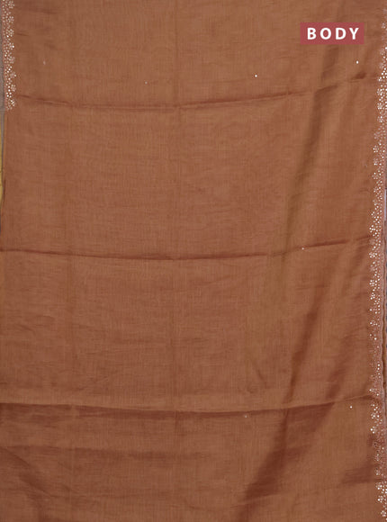 Art linen saree rust shade with embroidery mirror work buttas and convent embroidery pallu