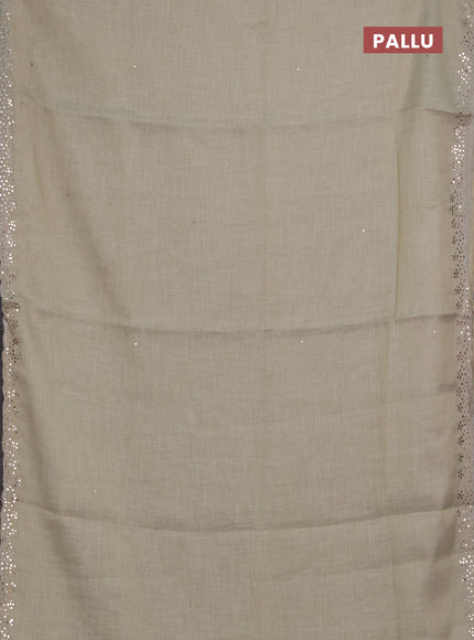 Art linen saree beige with embroidery mirror work buttas and convent embroidery pallu