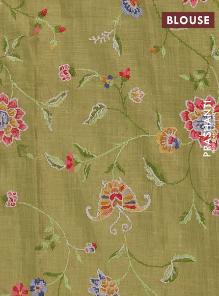 Art linen saree light green with embroidery mirror work buttas and convent embroidery pallu