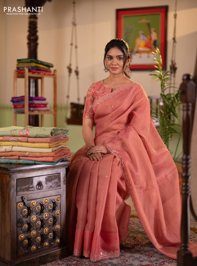 Art linen saree peach pink with embroidery mirror work buttas and convent embroidery pallu