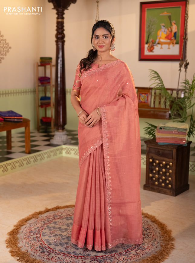 Art linen saree peach pink with embroidery mirror work buttas and convent embroidery pallu