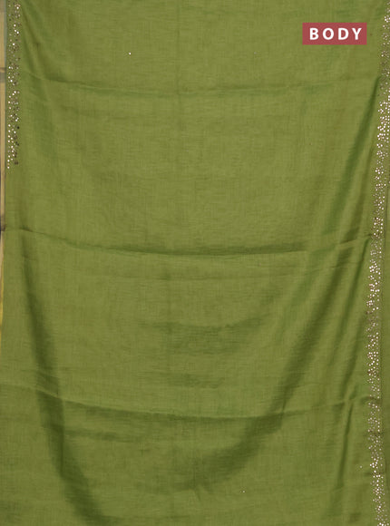 Art linen saree light green with embroidery mirror work buttas and convent embroidery pallu