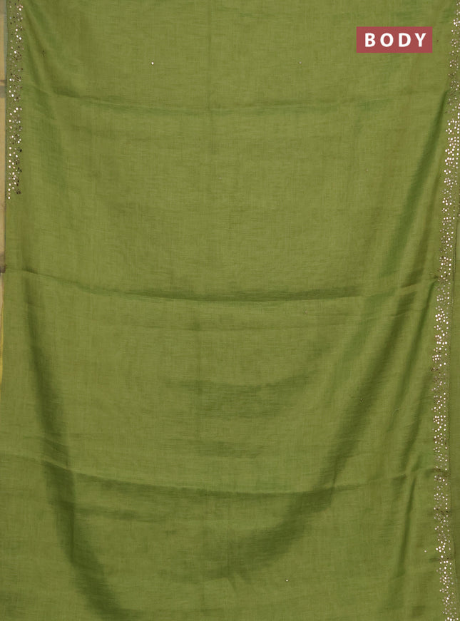 Art linen saree light green with embroidery mirror work buttas and convent embroidery pallu