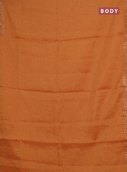 Art linen saree orange with embroidery mirror work buttas and convent embroidery pallu
