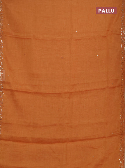 Art linen saree orange with embroidery mirror work buttas and convent embroidery pallu