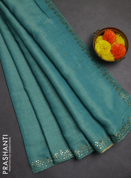 Art linen saree teal blue with embroidery mirror work buttas and convent embroidery pallu