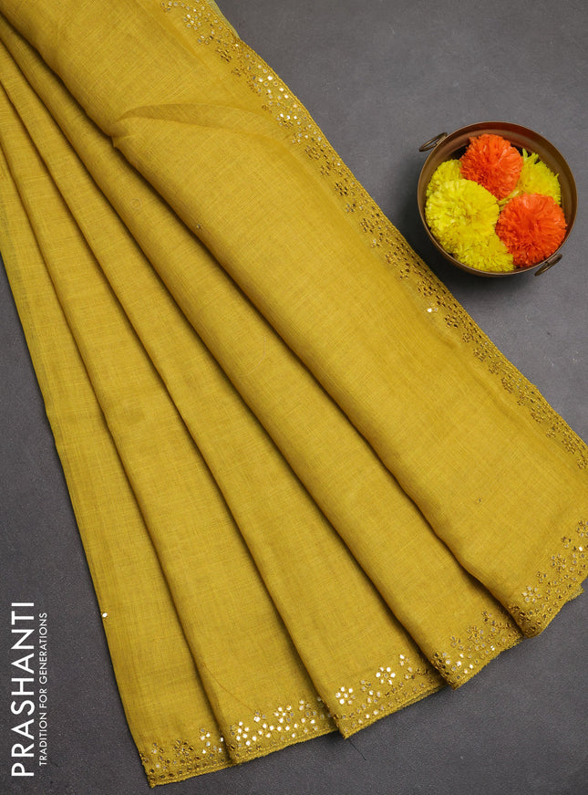 Art linen saree mustard yellow with embroidery mirror work buttas and convent embroidery pallu