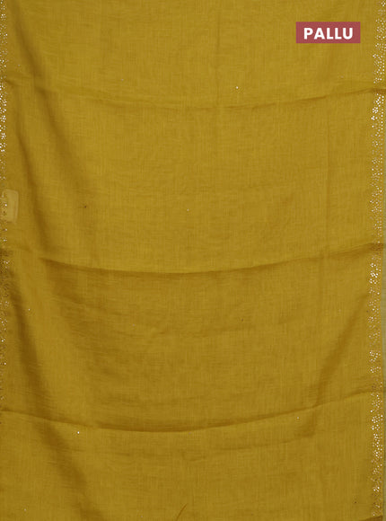 Art linen saree mustard yellow with embroidery mirror work buttas and convent embroidery pallu