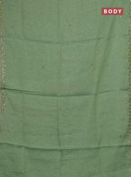 Art linen saree light green with embroidery mirror work buttas and convent embroidery pallu