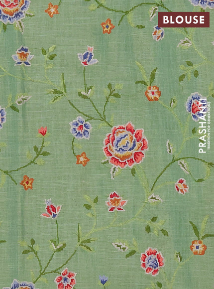 Art linen saree light green with embroidery mirror work buttas and convent embroidery pallu