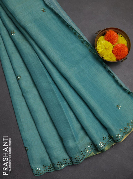 Art linen saree teal blue with embroidery mirror work buttas and convent embroidery pallu