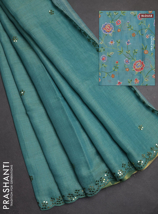 Art linen saree teal blue with embroidery mirror work buttas and convent embroidery pallu