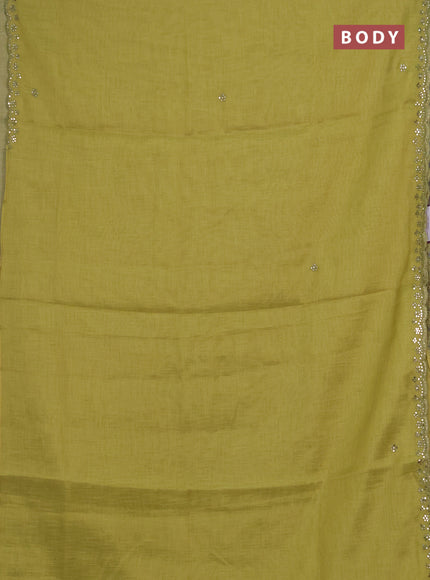 Art linen saree lime green with embroidery mirror work buttas and convent embroidery pallu