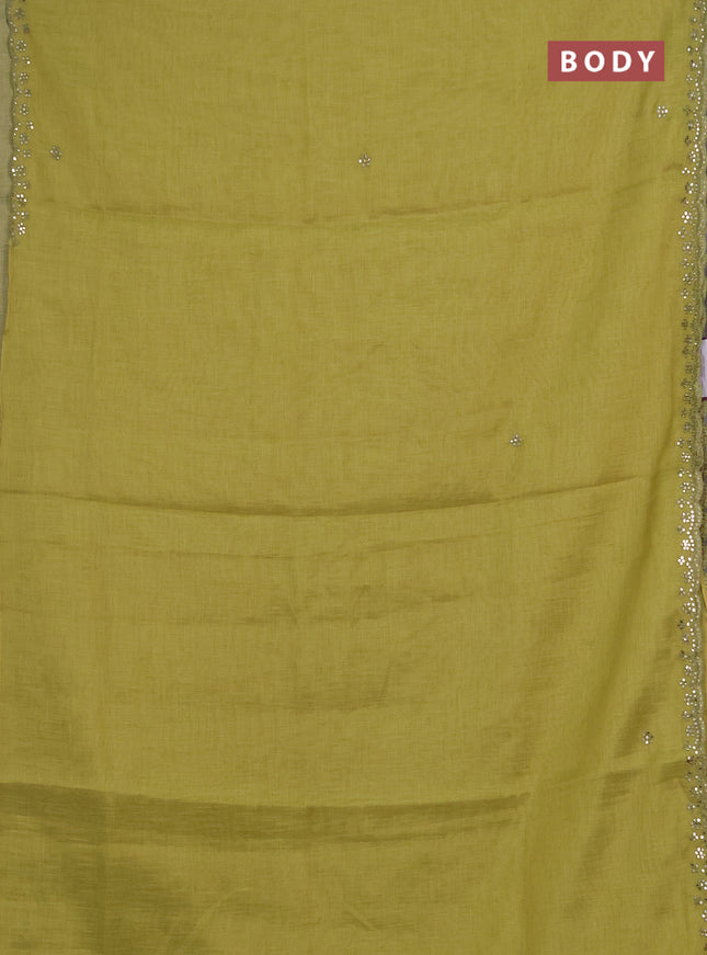 Art linen saree lime green with embroidery mirror work buttas and convent embroidery pallu